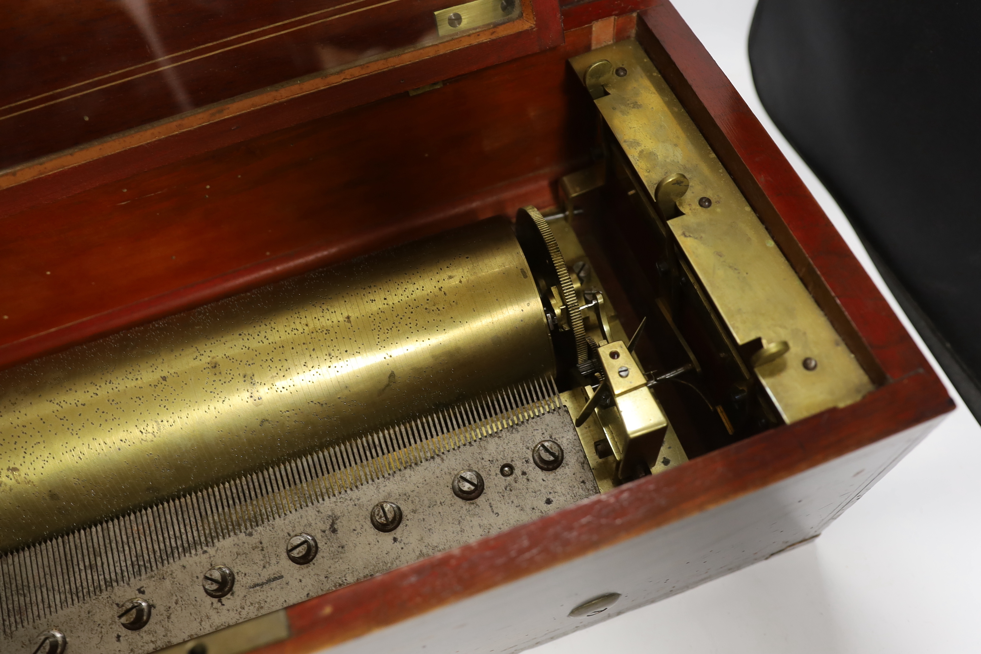 A late 19th century Swiss rosewood inlaid cylinder music box by Nicole Freres, playing twelve airs on one hundred and twenty-nine teeth, barrel 31cm wide, case 53cm wide, 22.5cm deep, 17cm high